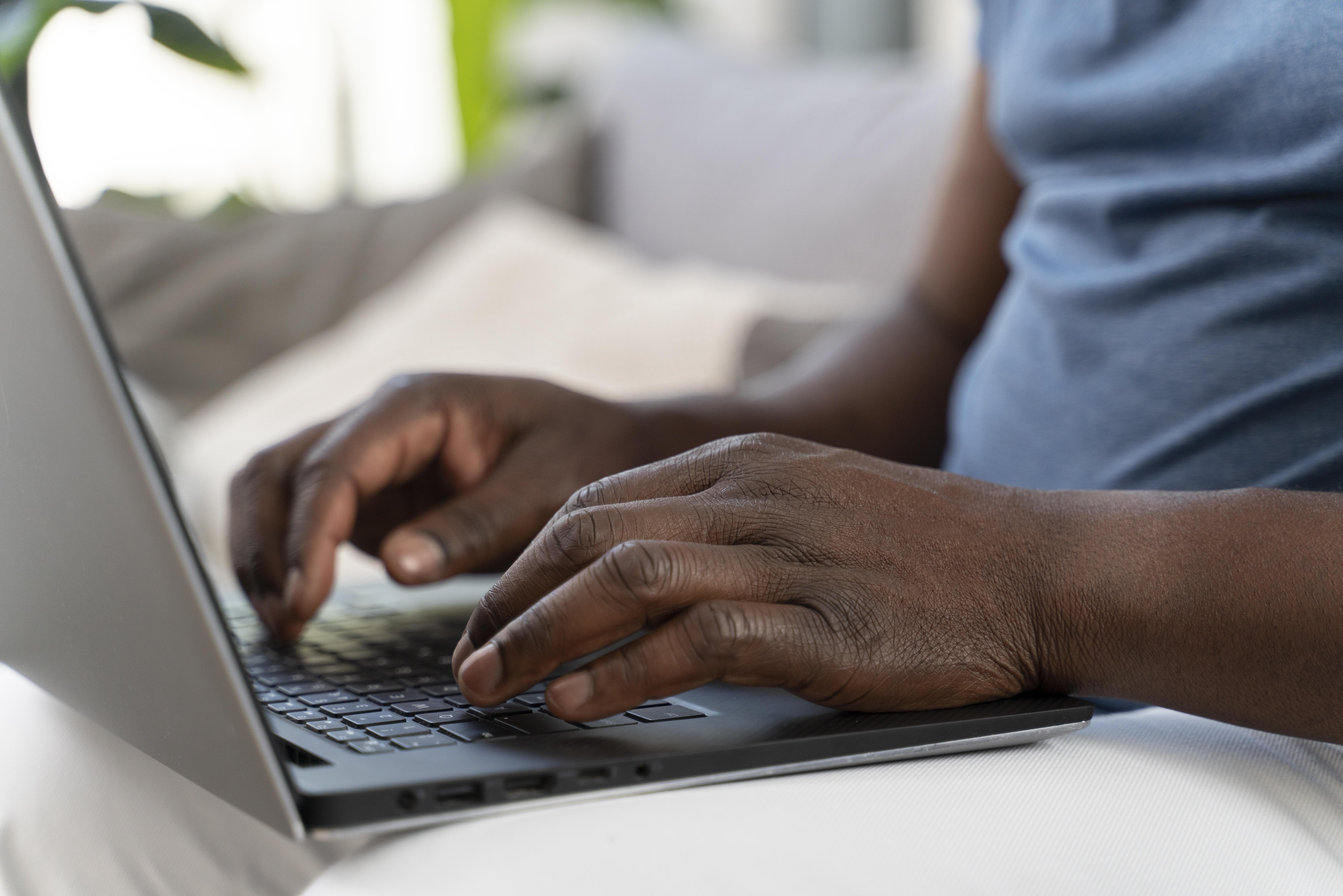 https://zanaschools.com/wp-content/uploads/2024/08/african-man-working-from-home.jpg