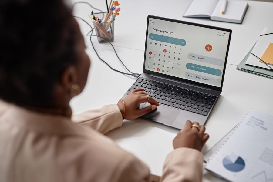 https://zanaschools.com/wp-content/uploads/2024/10/laptop-screen-with-calendar-page-typing-black-woman_236854-60088.jpg